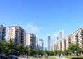 Urban skyline with modern multifamily buildings and greenery.