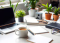 A bright workspace with a laptop and coffee cup.